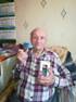 Дмитрий Кудинов вручил ветерану мобильный телефон